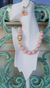 Stunning Coral Jade  Necklace Wrap. Gold pave Leopard clasp and beautifully matched coral jade beads. Luxury hand crafted jewelry designed exclusively by Mindy Grutman. 